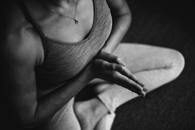 woman meditating on the floor