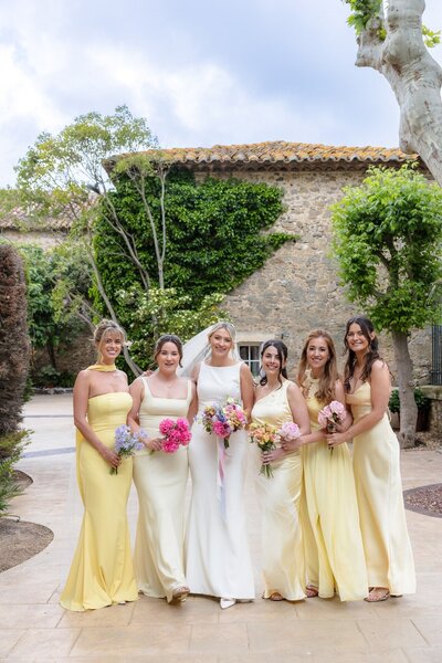 bride-and-bridesmaids-colorful-bouquets-france