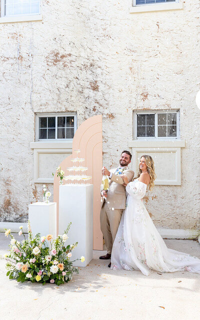 St Augustine bride and groom cutting a cake in an outdoor wedding