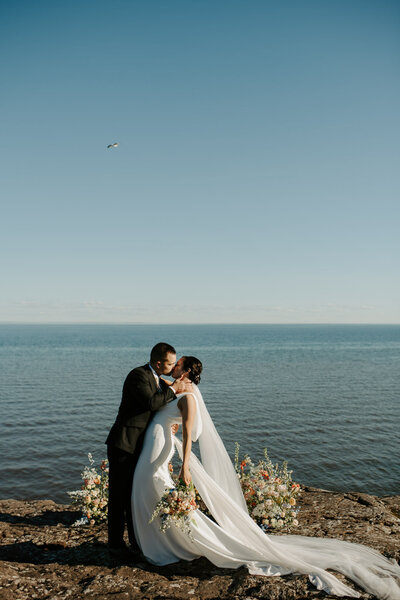 Couple in the woods on their wedding day.