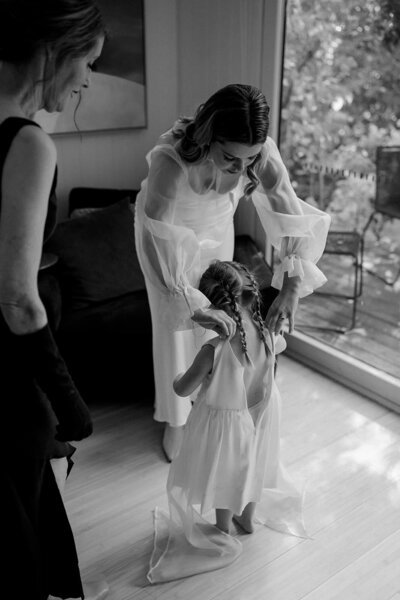 cute flower girl getting ready before mount macedon wedding