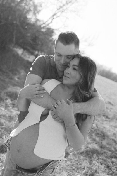 Cinematic couple during their maternity session in Eureka Missouri