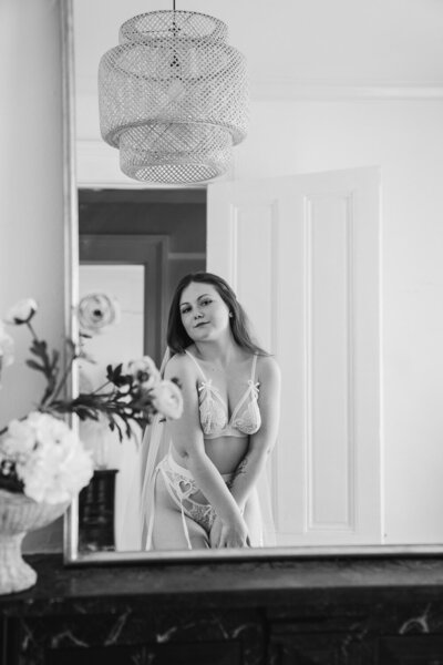 bridal boudoir photo in mirror wearing veil