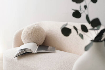Cozy therpy couch for online trauma recovery coaching, supporting survivor's of humanitarian crises through for Brainspotting Help ™ 