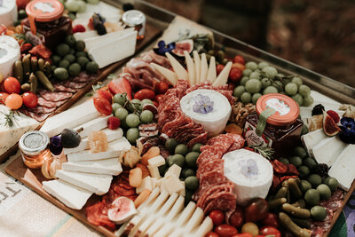 Delicious grazing table with fresh fruit, cheese and cold meats