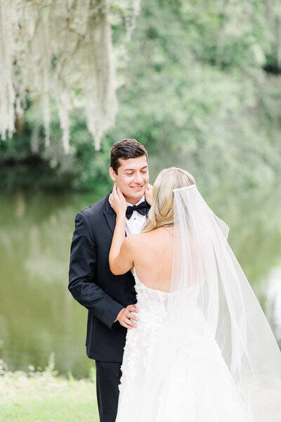 bride and groom during their first look