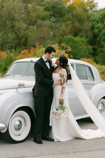 beautiful luxury wedding near a  classic car