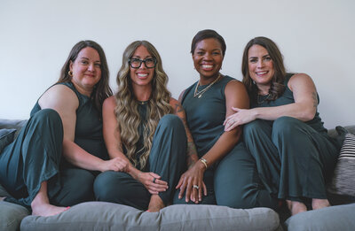 Black career coach for women sitting on couch
