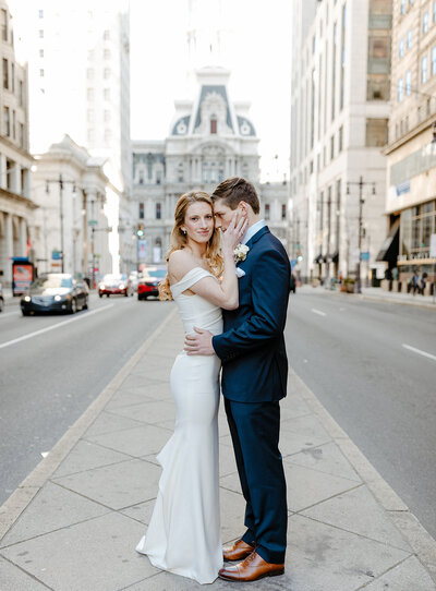 Bride and groom in front of City Hall in Philadelphia