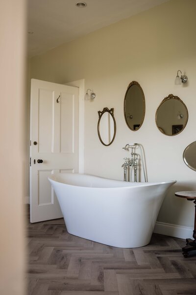 A large bath is seen in the principal wedding suite at Kinclune House.