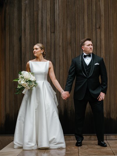 Bride and groom walk up memorial steps at their DC wedding