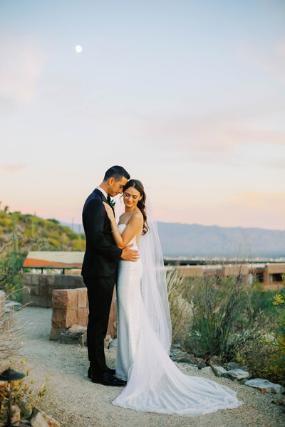 Professional portrait featuring Lara Gabrielsen, a renowned wedding photographer based in Scottsdale, Arizona. This gallery captures the passion, creativity, and dedication that Lara brings to each shoot, set against the beautiful backdrop of the Arizona desert. Whether in action capturing stunning moments or in poised, thoughtful poses, these photos highlight the artistry and personal connection that defines Lara’s work.