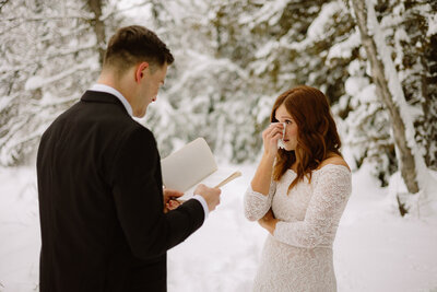 emotional vows during wedding ceremony in kelowna winter