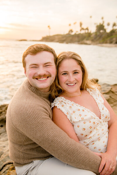 family smiling together during photo session in san diego by experienced family photographer mattie taylor