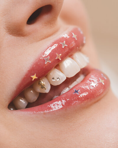 Teeth whitening tooth gems smile portland Oregon peroxide bleaching fairy appointment gold crystals modern safe clean private studio Jamie Carle