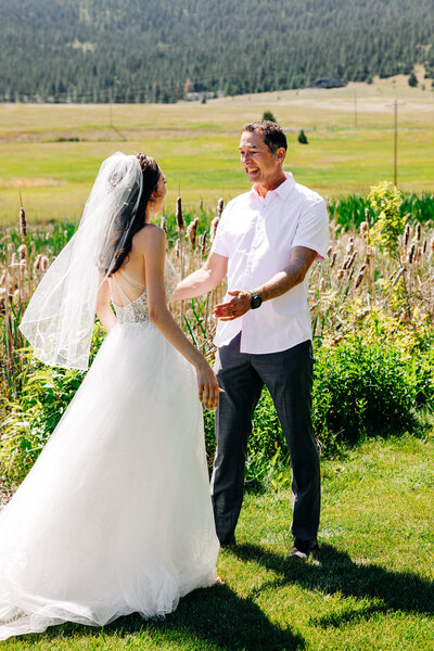 Bride first look with father at Flathead Lake Forevers, Montana