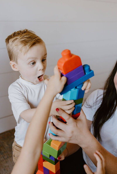 kids playing with colored blocks