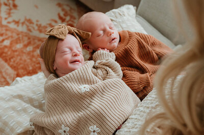 Newborn twins snuggling during an in-home lifestyle photography session in Charlotte, NC.
