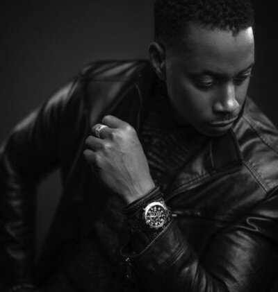 black and white photo of Andre looking away from camera