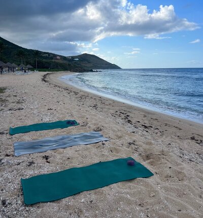 yoga mats on the beach in st. croix