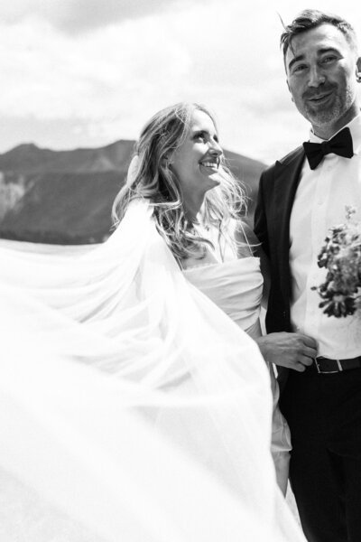 real wedding in edmonton alberta, bride looking at groom during couples portraits