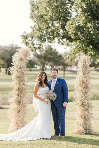 Couple under wedding veil by Dallas wedding photographer Haley Hill