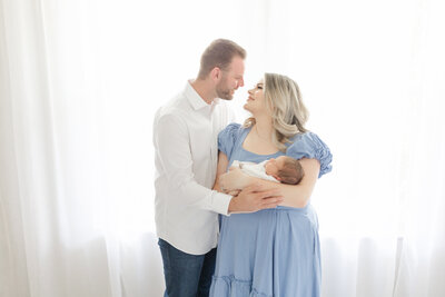 Luxury newborn portrait of Tampa baby boy swaddled in neutral tones 