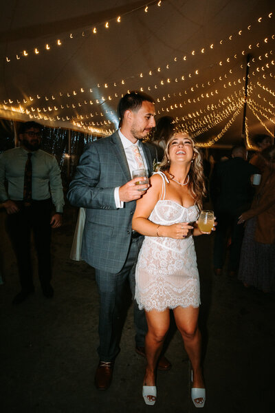 a photo of a bride and groom having their first dance