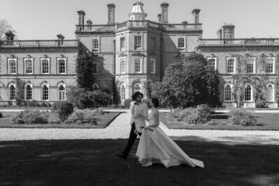 Bride and groom outside their beautiful London wedding venue