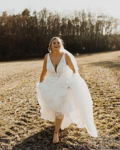bride running and laughing