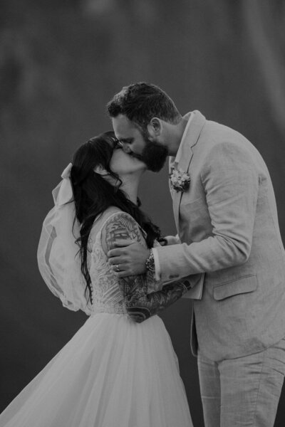 Couple kisses during their Telluride elopement