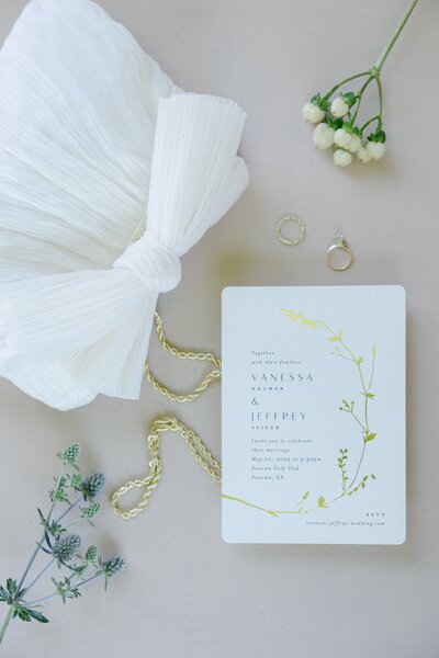 beautiful detail photos of a wedding invitation at fairmont sonoma mission inn and spa