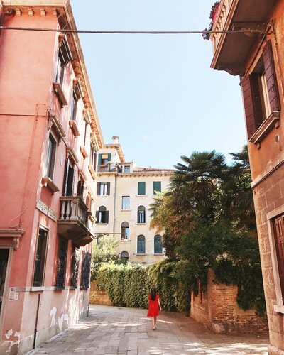 exploring small streets in venice, italy