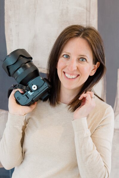 Sitting at desk looking at camera Sugarhill Studio Longmont Colorado