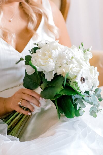 Bride holding white bouquet