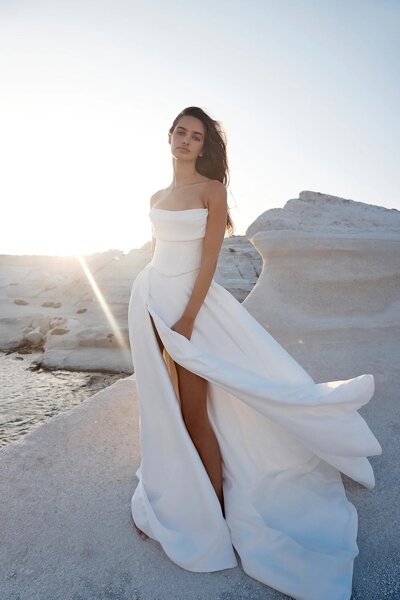 Be followed by a train of lustrous duchess satin every step you take with the KYHA BRIDE 'Milford' Skirt.

With a fitted waistband and full pleated skirt with a modern split, the Milford Skirt can be styled as an overskirt to raise the drama of any look or with the Kasia Corset to upgrade to a modern ballgown.