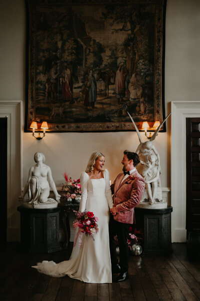 Bride and Groom in the main ceremony hall of Elmore Court. 