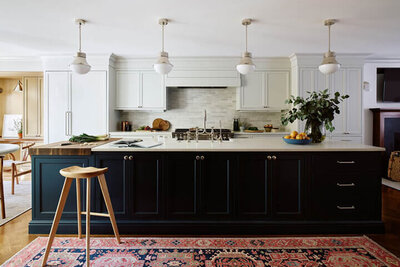 A custom kitchen design in a renovated Boston brownstone, blending historic charm with modern functionality and timeless details.