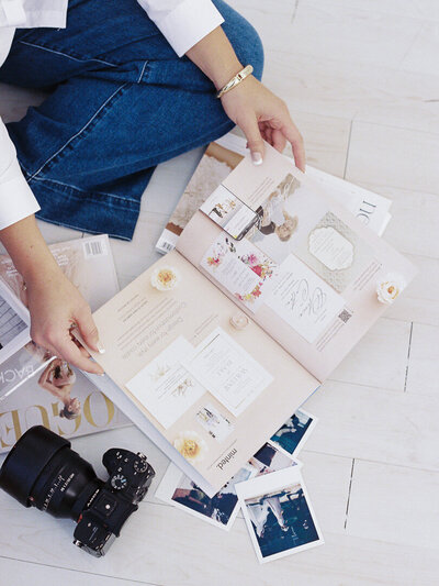 photographer holding styling mat brand session with film