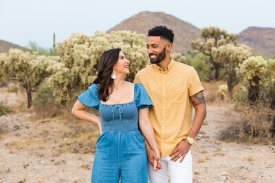 couple holding hands in the Scottsdale desert