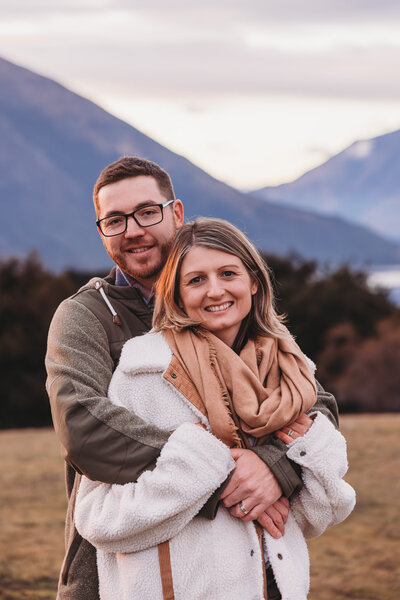 couple posing during an engagement photoshoot in wanaka with Captured by Bie