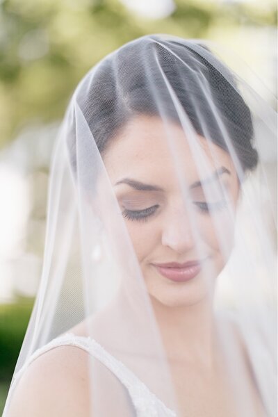 Bride wearing her veil for her wedding day portrait session