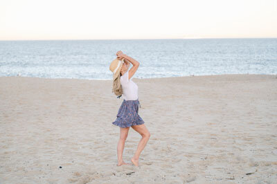 Free spirit branding shoot at beach, female relaxed