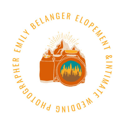 Submark logo with yellow text stating "Emily Belanger Elopement & Intimate Wedding Photographer" encircling a Cartoon orange camera with a mountain range with rays in the peaks and trees in the lens