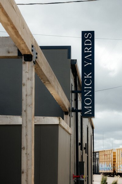 The sign at Monick Yards.