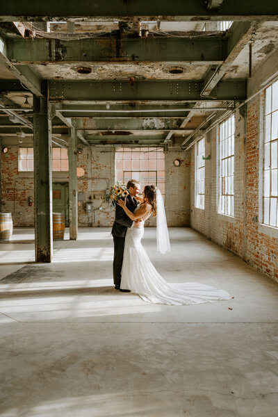bride and groom share first look at the old sugar mill outside sacramento