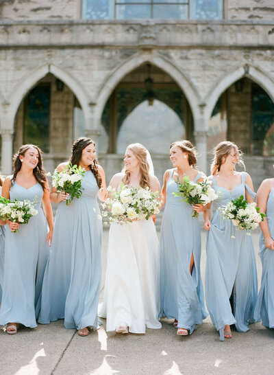 Bridesmaids and Bride Walking in Front of Church in Downtown Asheville NC