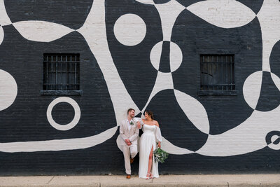 Bride and groom walk up memorial steps at their DC wedding