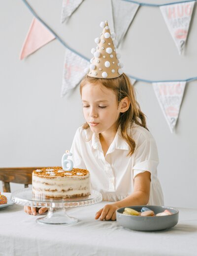 Parents and children enjoying a birthday party in the café space