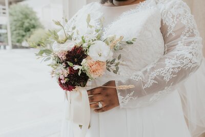 A Nashville bride holding a bridal bouquet at her wedding